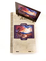 Wooden puzzle with 500 pieces. The magic of nature. A tree among mountains and flowers