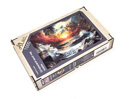 Wooden puzzle with 1000 pieces. Ships and the sea. Stormy sunset over the sea
